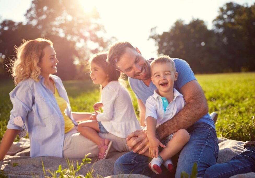 Young,Family,With,Children,Having,Fun,In,Nature